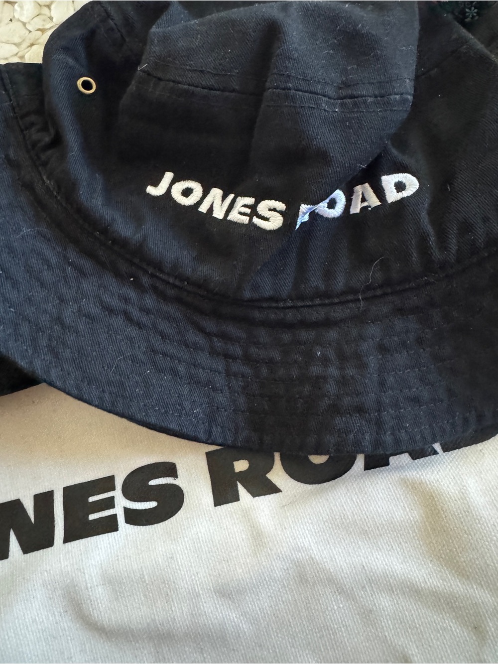Jones Road Cream and Black Canvas Duffel with bucket hat